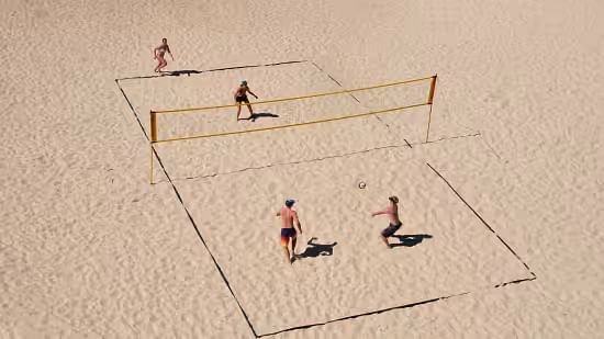 Four people enjoying a lively game of volleyball on the beach