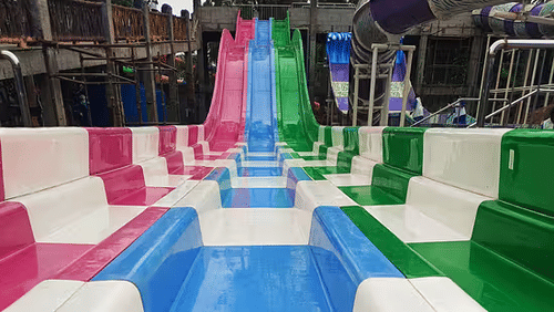 Colourful water slide at Black Thunder water park with vibrant tubes and splash zones