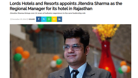 A man in formal attire pictured in an article about his appointment in Rajasthan - Lords Hotels & Resorts