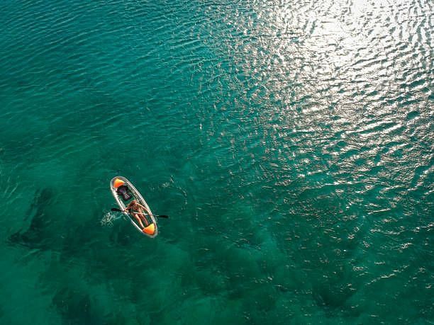 An image of a boat floating on  a river -  Alibu Resort Nha Thrang