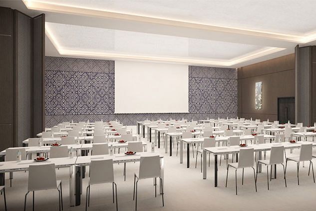 an event hall decked with rows of chairs at The Residency Towers Rameswaram