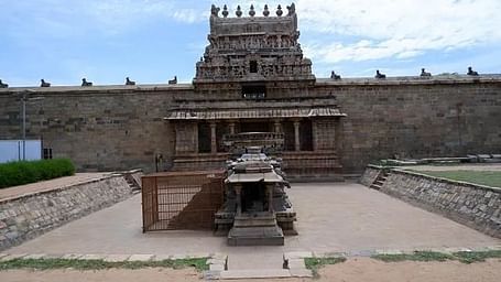 View of the grand temple structure at Dharasuram, with detailed sculptures and steps leading up to the entrance