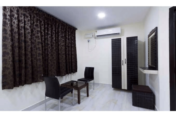 Neat decor and essential amenities in Classic Single at Udipi Home Egmore