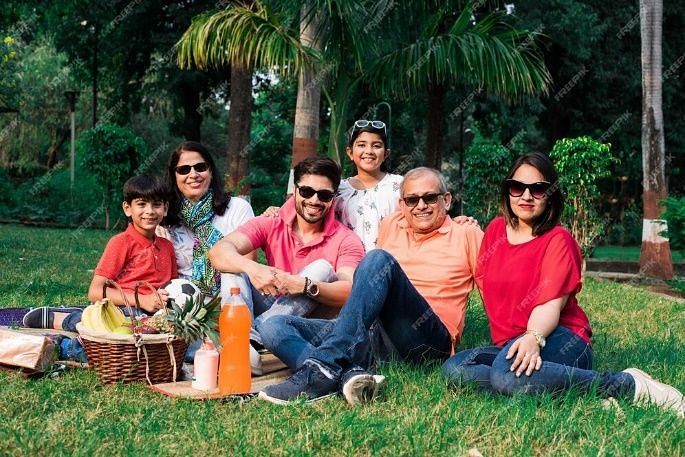 Family enjoying Picnic Amongst Nature