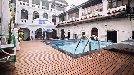 A swimming pool at The Old Courtyard Hotel