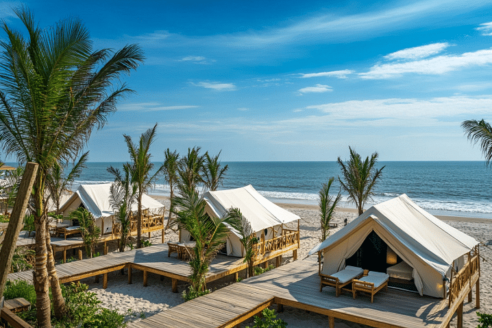 Sub-aerial view of tents on wooden paddocks on a beach