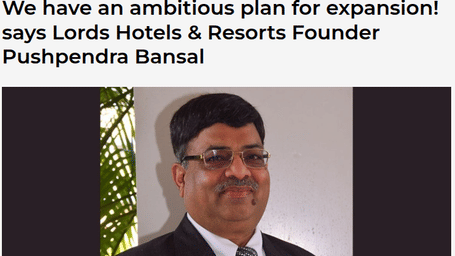 A man in a suit pictured in an article about expansion plans by the founder Pushpendra Bansal - Lords Hotels & Resorts