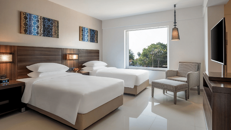 Twin Room with two bed overlooking the pool at The Residency Towers Rameswaram