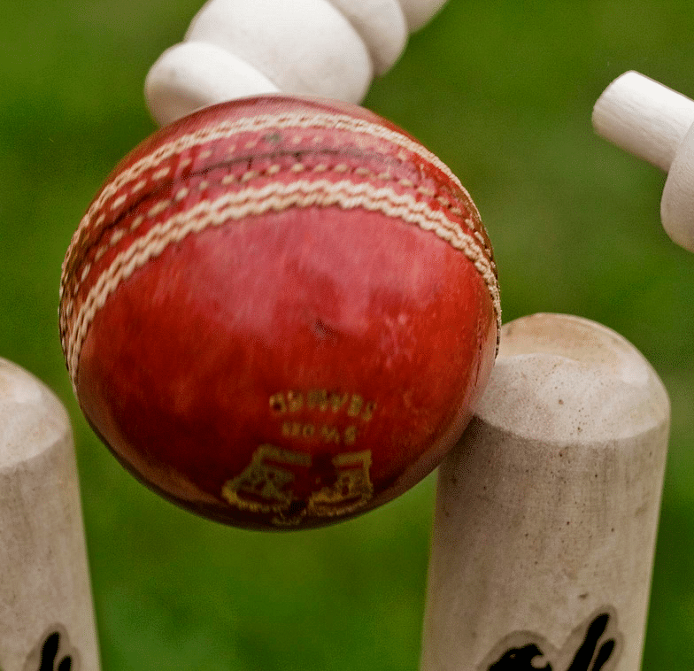 An image of a ball hitting the stump
