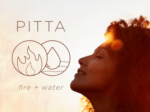 Woman with curly hair enjoying sunlight outdoors, beside text ‘Pitta’ with icons of fire and water at YO1 Longevity & Health Resorts