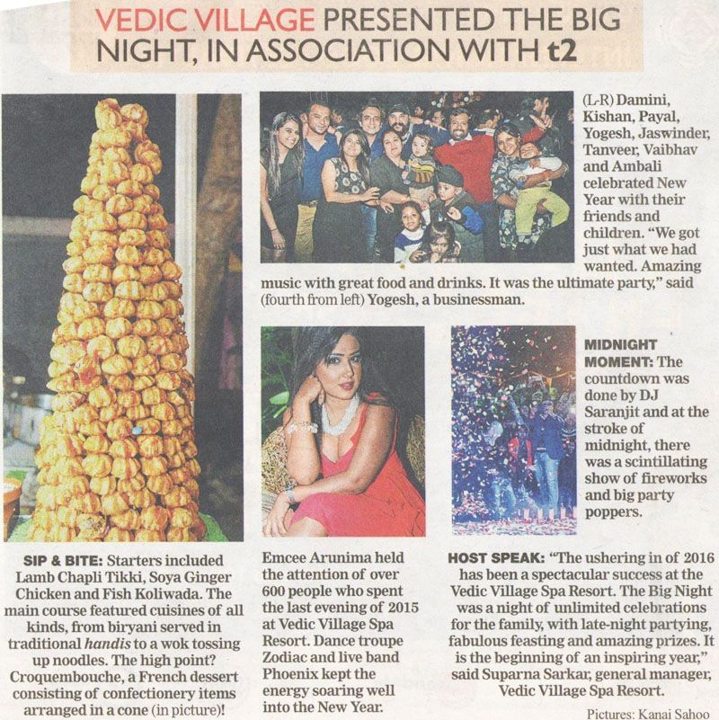 A newspaper clipping featuring a big night feast at Vedic Village Spa Resort.