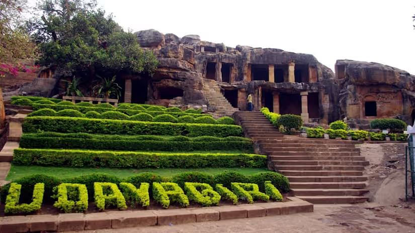 Exterior of Khandagiri Udayagiri Caves with a landscaped section near the entrance