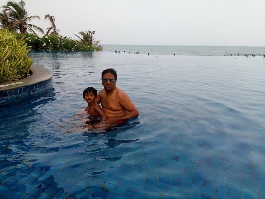 An image of a two individuals in a swimming pool.