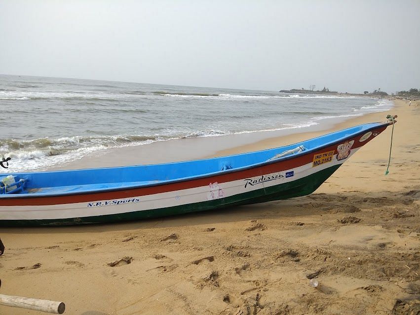 an image of a boat by the shore.