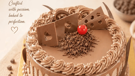 A cake placed a on a plain background.