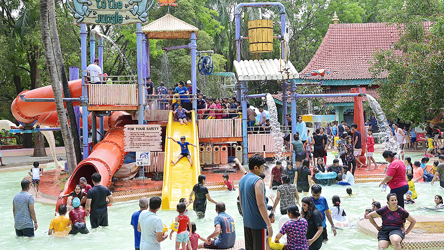Water Kingdom - groups of people in pool at water park