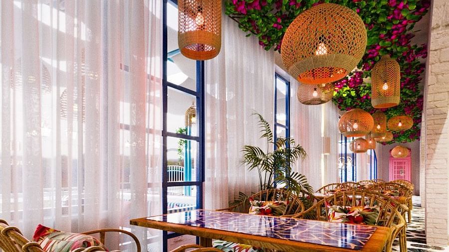 A warm dining area at Themis Mudhouse - A Nature's Retreat Resort & Wellness with plush seating arrangements