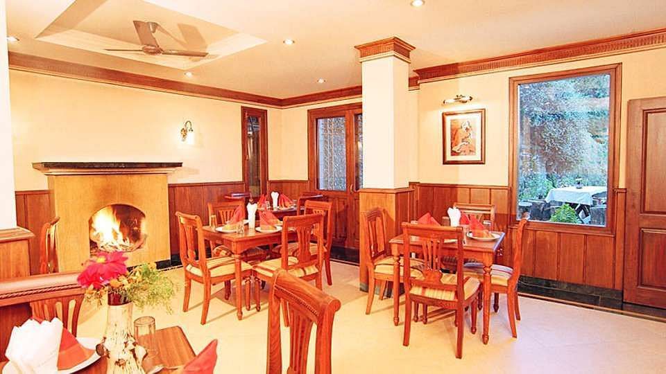 Sun n Snow Inn Hotel Kausani Kausani Restaurant Sun n Snow Inn, hotels in kausani, Uttarakhand hotels, kausani hotels