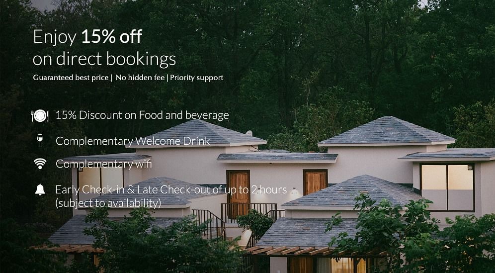 Resort villas with trees, promoting 15% off on direct bookings with added guest benefits.