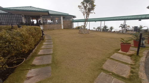 the lawn area at Courtyard in Cherrapunjee 2