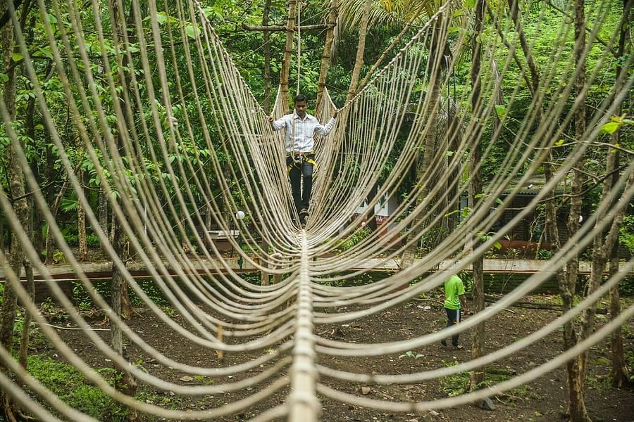 Burma Bridge - Sajan -Thrilling Burma Bridge activity at Nature Trails Sajan, offering an adventurous crossing experience.