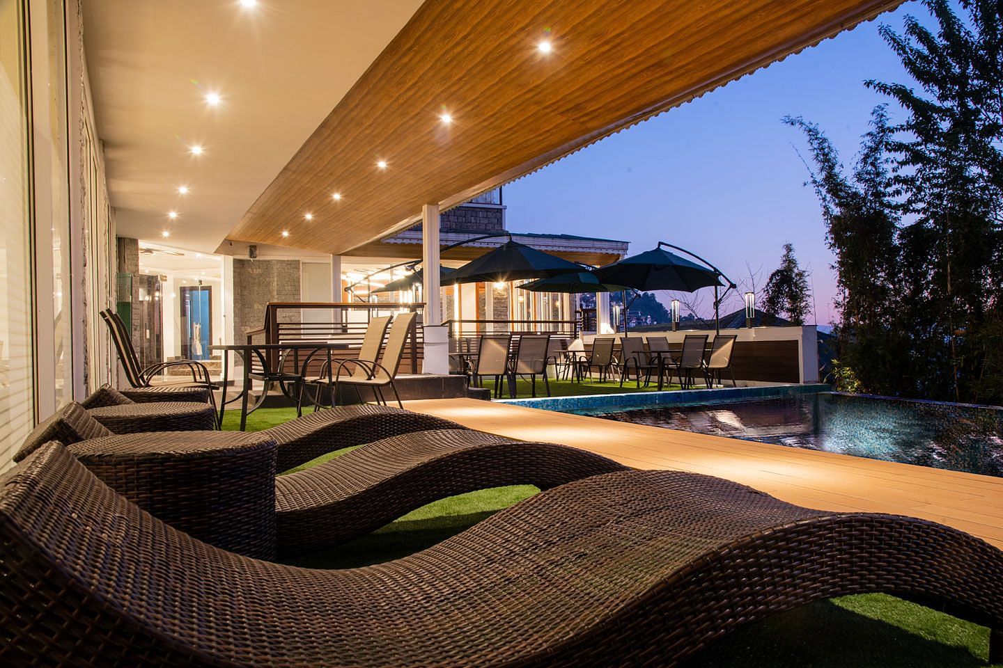 A close up shot of the sun loungers placed by the pool - Summit North Star, Gangtok
