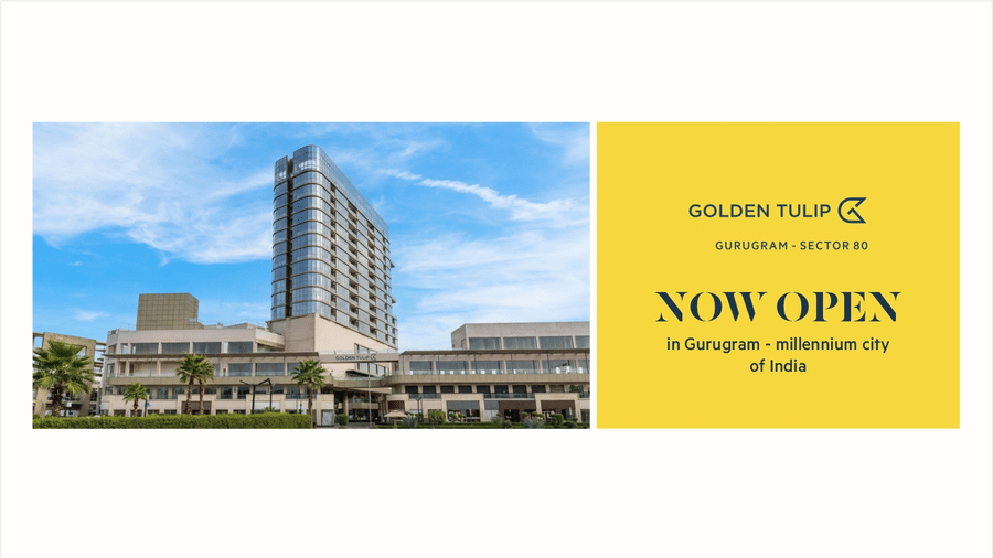 Golden Tulip - Sector 80, Gurugram's website banner showcasing the multi-storey facade of Elan Mercado, and the hotel's exterior situated before it under broad daylight.