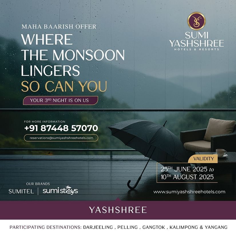 Rainy terrace with umbrella and chair promoting Sumi Yashshree's monsoon offer – third night free at select hill destinations.