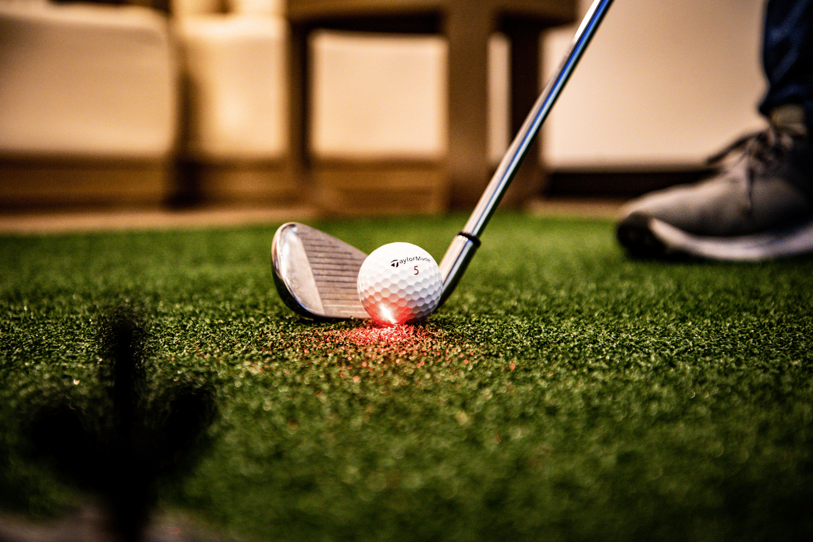 Indoor golf simulator experience at Tamarind Hills Resort, Antigua.