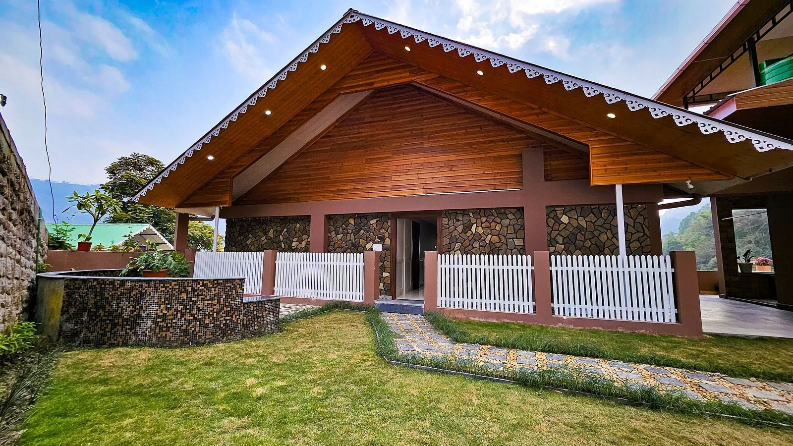 exterior of the hotel with a small lawn