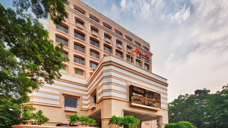 Facade of Grand Chennai By GRT Hotels during daytime.