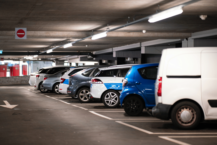 Covered parking facility with multiple vehicles parked in an organised indoor space at Bhavanis Vista By Icon Hosur.