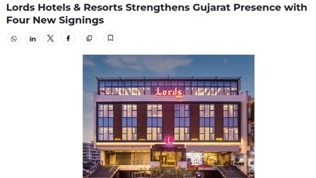 A news feature with an image of a hotel building under the headline about new signings - Lords Hotels & Resorts