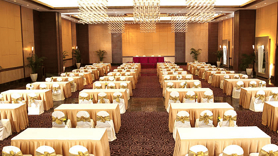 Tables set up for an event at our Convention Centre in Mumbai, one of the premier corporate party venues in Mumbai.
