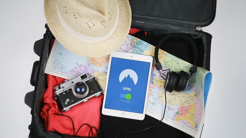 Summer travel essentials in a suitcase