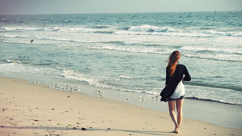 woman walking on the beach