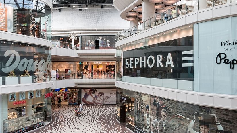 A Shopping mall with outlets of big brands like sephora.