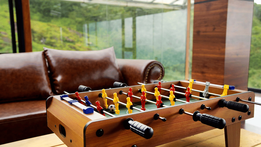 Shot of a Foosball table at the game zone of the villa | Ibex Stays and Trails, Valparai (Tale Rock)
