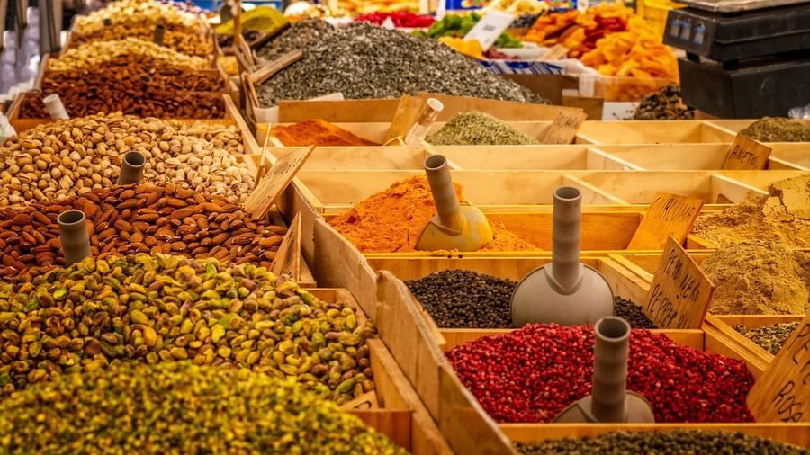 An overview of a market that is selling many types of spices and other things.