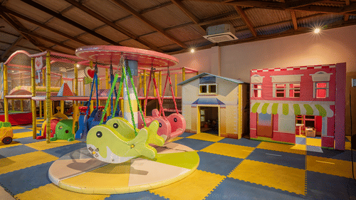 Indoor kids’ play area with colorful slides and toys at Silver Sand Sea Princess Beach Resort, Port Blair.
