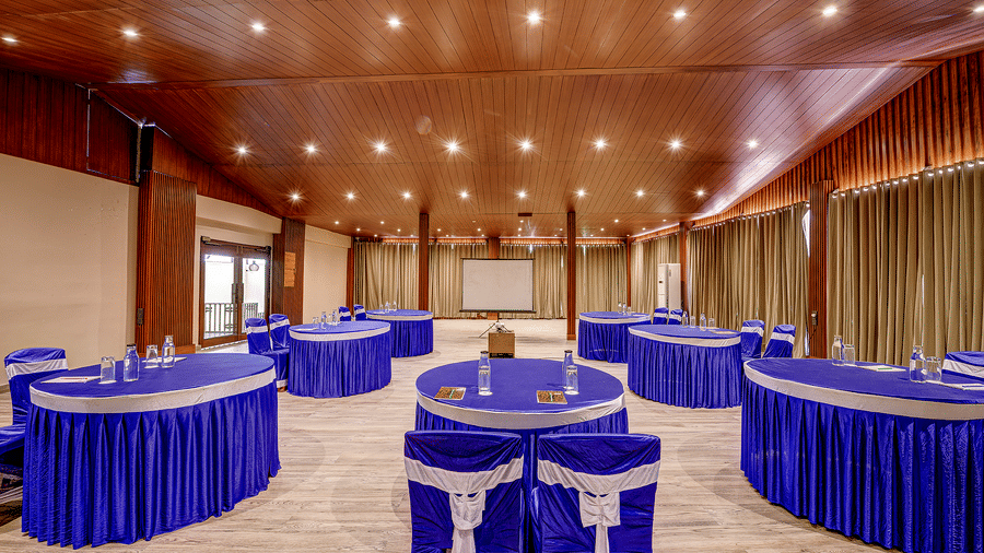 A spacious area with a round seating arrangement in the Conference Hall at Silver Sand Beach Resort, Havelock.