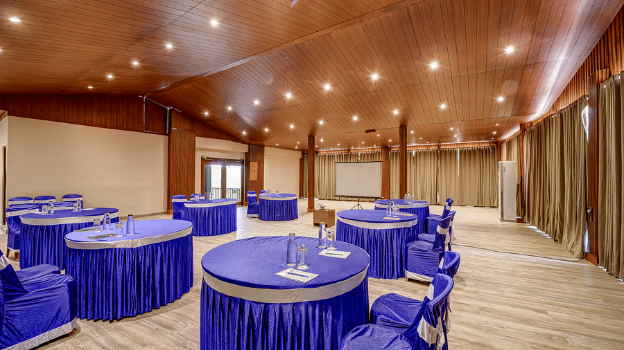A spacious area with a round seating arrangement in the Conference Hall at Silver Sand Beach Resort, Havelock.