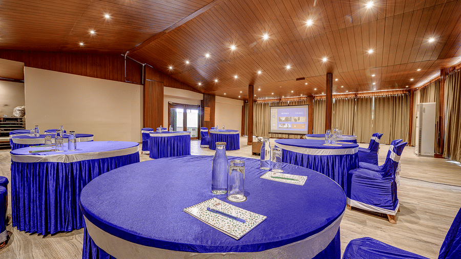 A spacious area with a round seating arrangement in the Conference Hall at Silver Sand Beach Resort, Havelock.