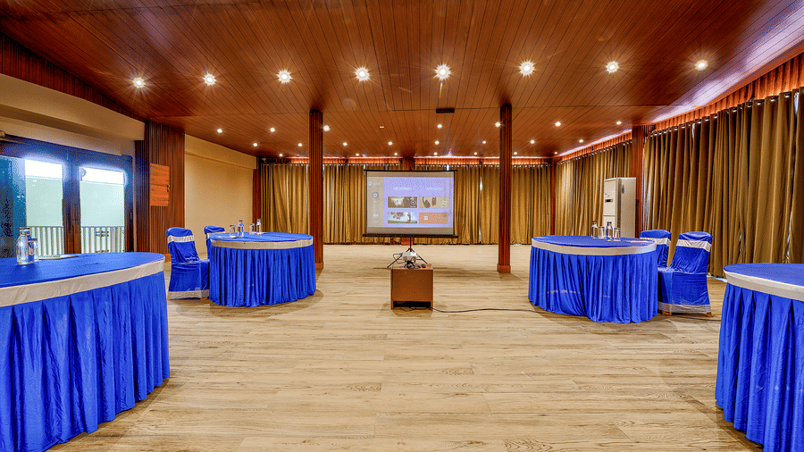 A spacious area with a round seating arrangement in the Conference Hall at Silver Sand Beach Resort, Havelock.