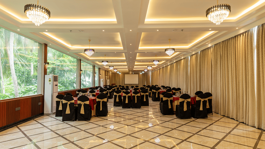 Banquet hall with elegant lighting and chair decor at Silver Sand Sea Princess Beach Resort, Port Blair.