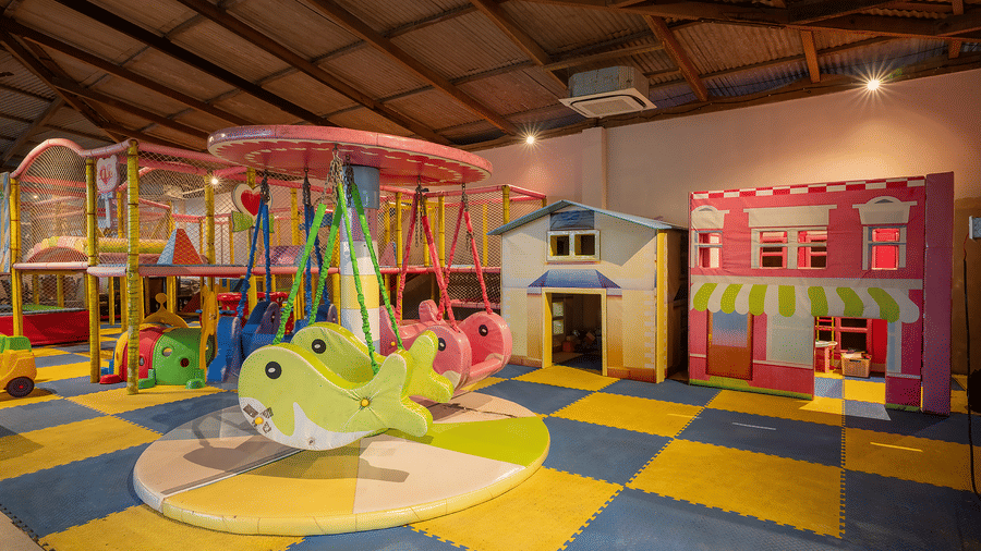 Indoor kids’ play area with colorful slides and toys at Silver Sand Sea Princess Beach Resort, Port Blair.
