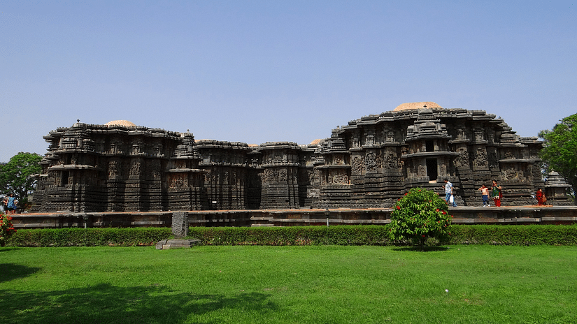 Exterior view of Hoysaleswara Temple on a bright sunny day