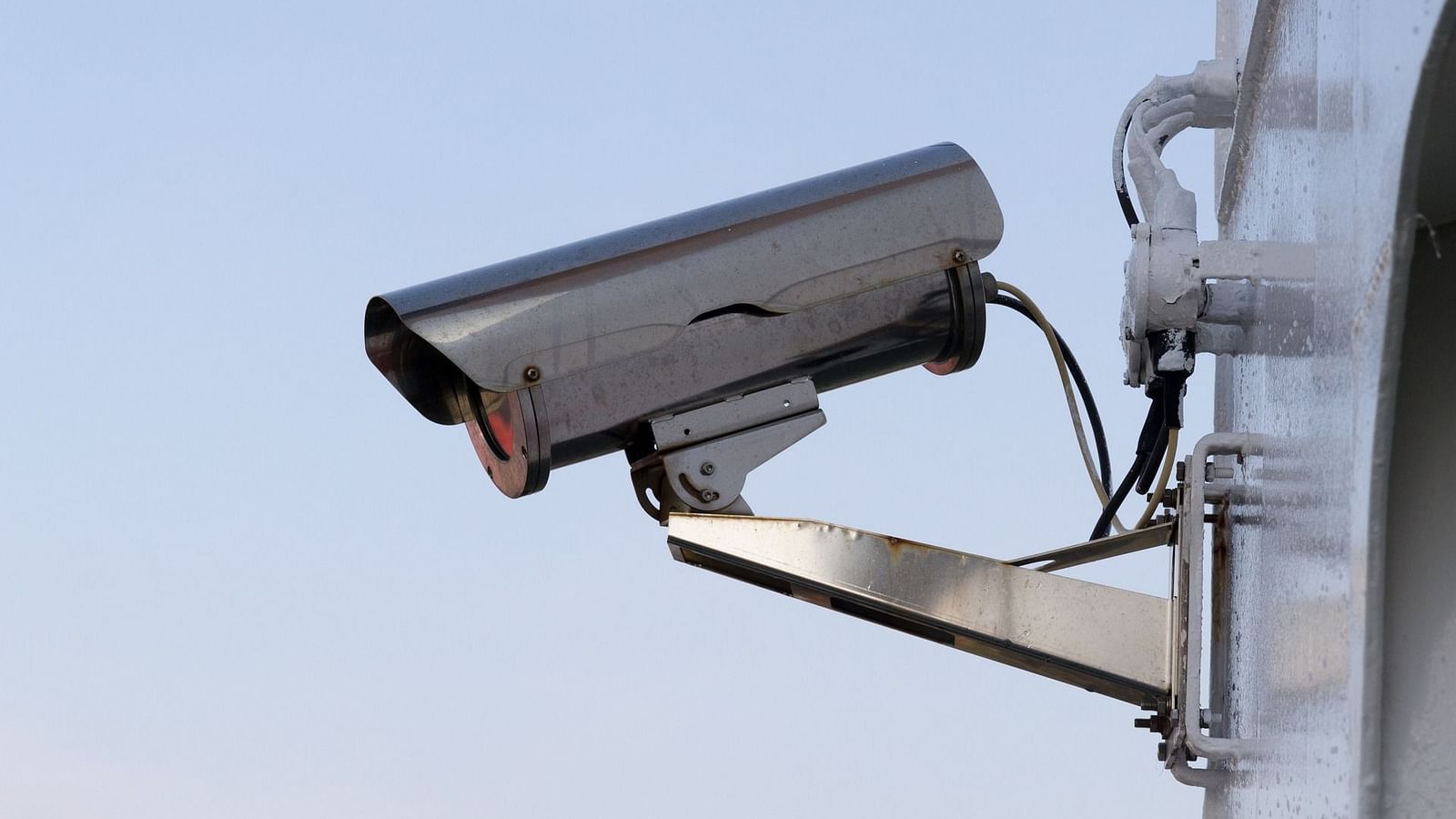 Image of a CCTV camera mounted on a wall.