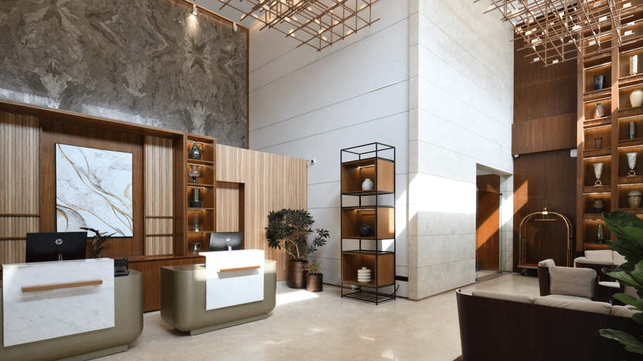 Hotel lobby interior with modern seating, high ceilings, and refined decor | Ramada Encore by Wyndham Gurugram Dwarka Expressway