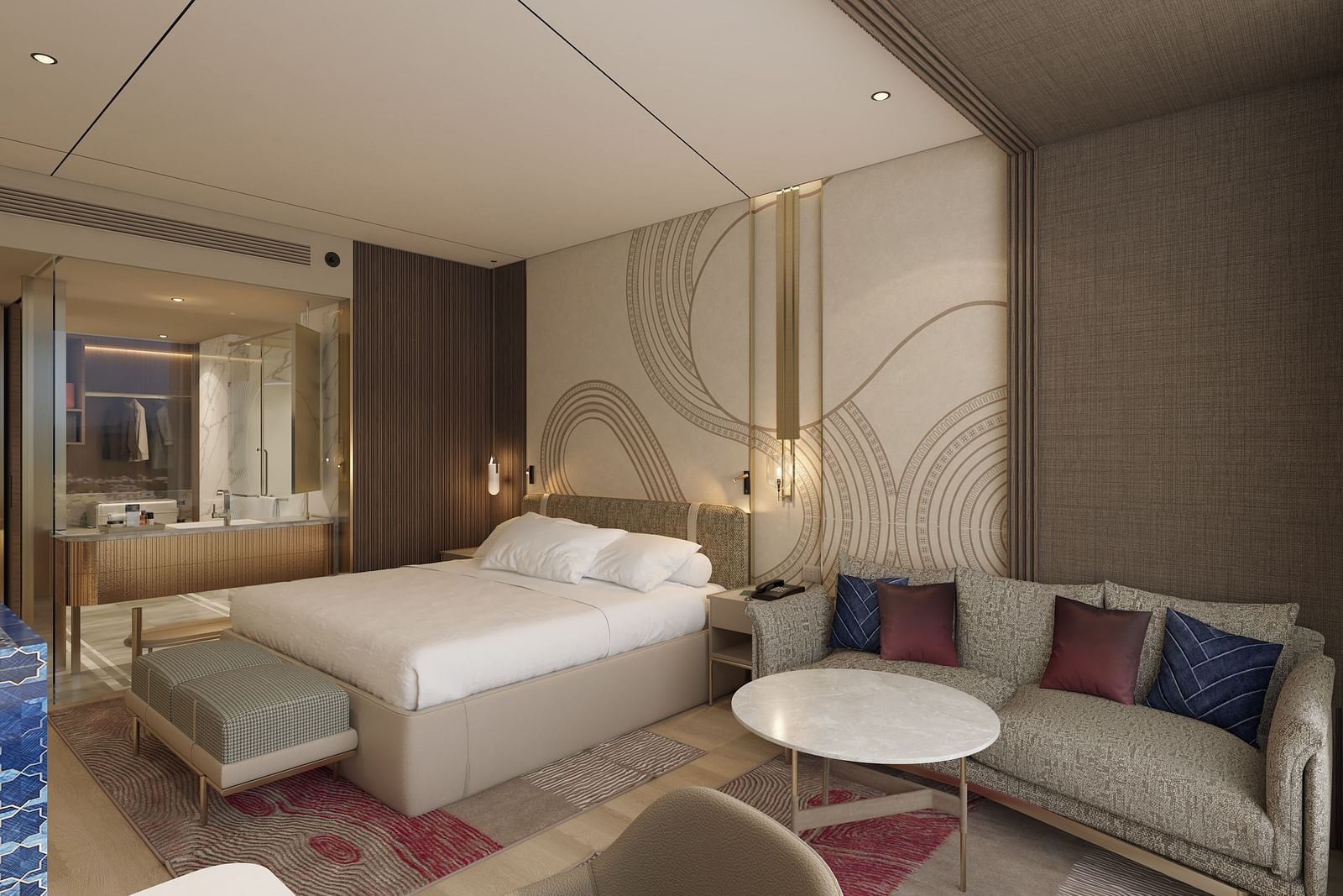 A double bed room with sofa and table, work desk and chair and rug